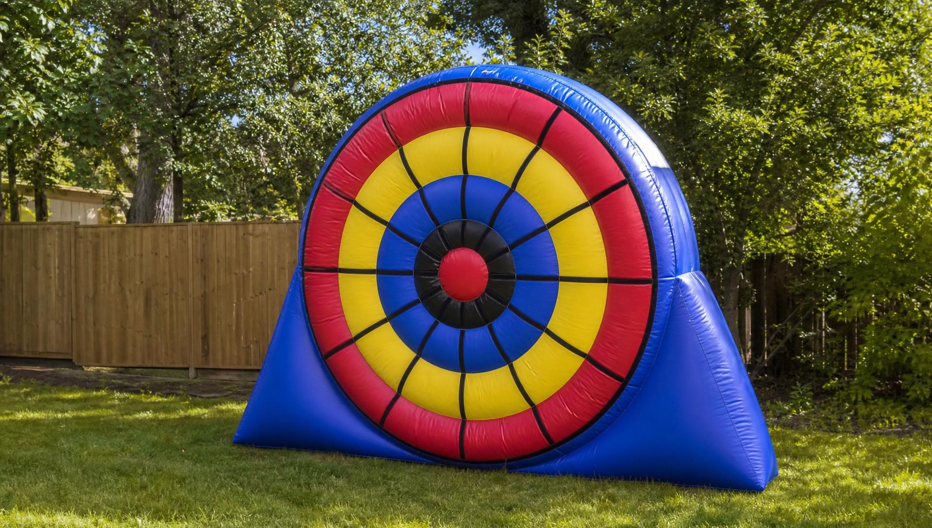 Colorful inflatable target game rental at a backyard party in Martinsburg WV
