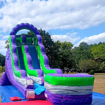 Purple and green inflatable water slide in Berkeley County WV